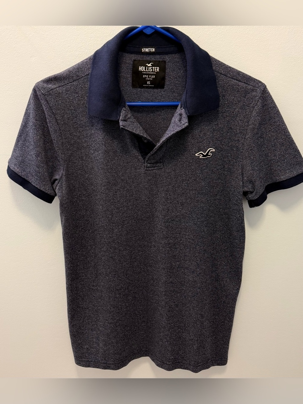 Hollister Men's Dark Navy Heathered Polo with Contrast Collar